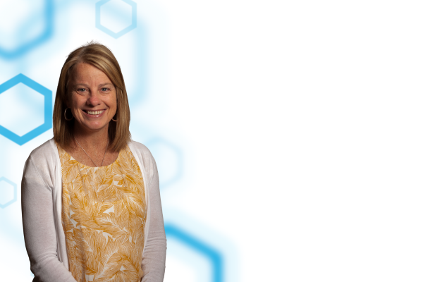 Sarah Rasmussen with blue hexagons behind her.